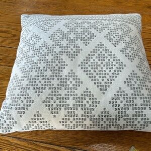 Pottery Barn pillow cover with feather insert. Tag states 20” square. Cream/gray